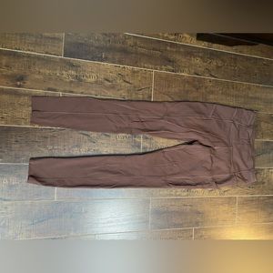 Fast and free pants. Worn only a few times. Length of leg is 28”
